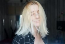 middle aged low maintenance shaggy shoulder length