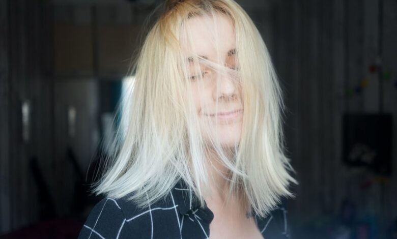 middle aged low maintenance shaggy shoulder length